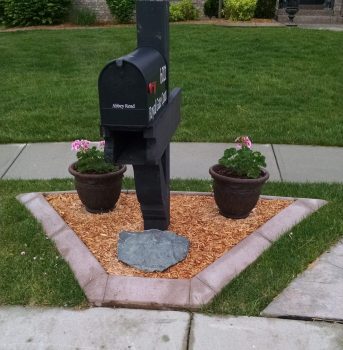 Landscape curbing mailbox